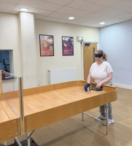 Kara stood at the end of the showdown table at the start of a game